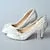 Elegant Vintage Pointed-Toe Wedding Pumps with Pearl Lace and Tassel Accents